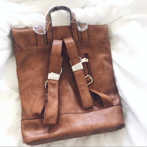 Bags Laser Cut Brown Faux Leather Backpack Poshmark